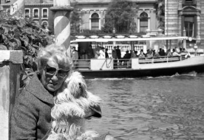 Peggy Guggenheim with her Lhasa Apsos terriers, on the terrace of Palazzo Venier dei Leoni