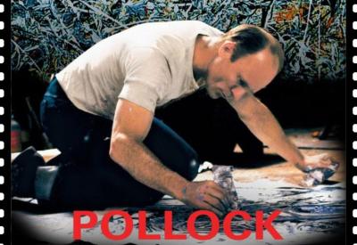 Ed Harris, a middle aged man with balding hair, as Jackson Pollock. Dressed in a white t-shirt and black trousers he is knelt down working on a piece of art, he is surrounded by his art materials.